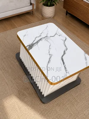 Fluted Pedestal Coffee Table With a Faux Marble Top