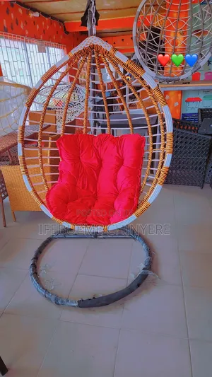 Gold and White Swinging Chair