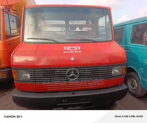 Mercedes 709 Pickup Long Chassis Red Color / 6 Tires and 6 Boat