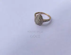 Genuine 1-Carat Natural Diamond Pear-Shaped Cluster Ring in Gold.