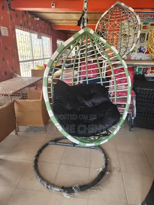 Green and White With Black Cushion Swinging Chairs