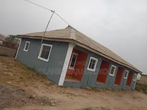 Full Plot. 4mini Flat,1 Roomself And A Shop In Front Of The Building