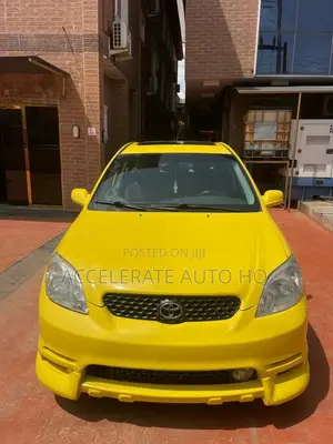 Toyota Matrix XR Hatchback AWD (1.8L 4cyl 4A) 2004 Yellow
