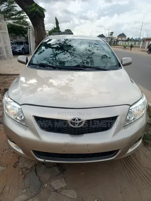 Toyota Corolla LE 4dr Sedan (1.8L 4cyl 4A) 2010 Gold