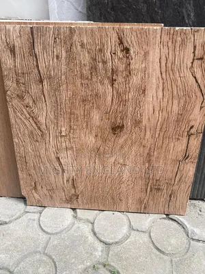 Beige Coloured Ceramic Floor Tiles With a Matt Wood-Effect Surface