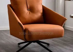 Brand New Orange Swivel Armchair