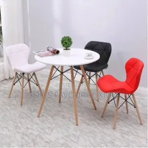 A Set of Dinning Table 3 Multi Coloured Top Leather Chairs