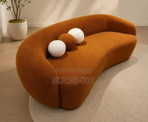 A Bouclé Sofa, Modern Crescent Lounge Sofa.