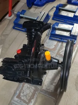 Appears to Be a Cast Iron Piston Air Compressor Pump Head, Often Used
