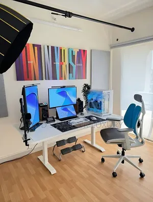 Smart Adjustable Computer Desk and Ergonomic Mesh Chair.
