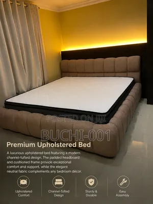 A Modern Channel-Tufted Upholstered 4x6 Bed Frame.