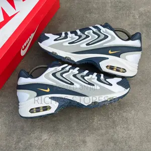 Nike Air Brazen White and Blue Yellow Accents