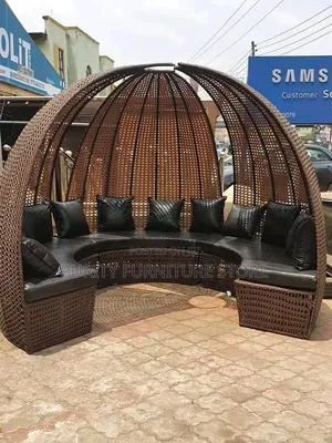 A Dome Canopy and Black Cushions