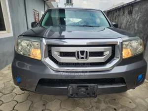 Honda Pilot Touring 4dr SUV 4WD (3.5L 6cyl 5A) 2009 Gray