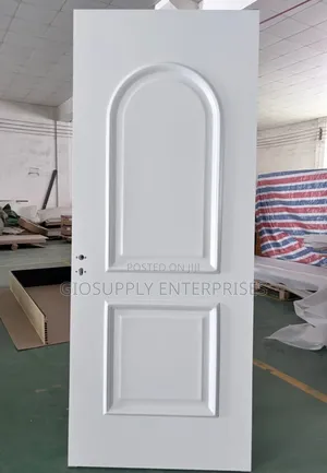White Arched Interior Door a Two-Panel Design With Molding Detailing