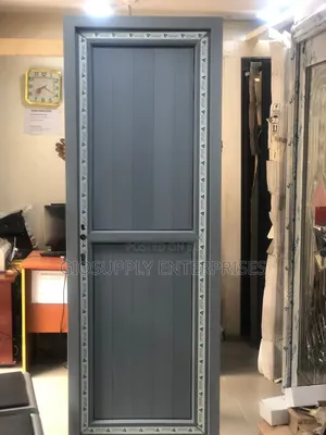 Gray PVC or Aluminum Bathroom Door With a Hinged Design
