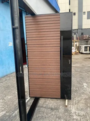 Pivot Luxury Door With a Horizontal Wooden Finish a Bold Black Panel