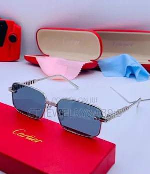 Fashion Cartier Sunglasses Featuring a Silver Frame and Blue Lenses.