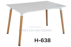 Table With Wooden Legs and Iron Leg