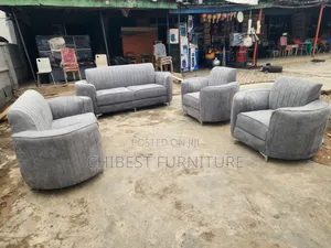 Neatly Padded Grey 7 Seaters Sofa Chairs.