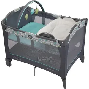 Bed With Reversible Napper and Changer Station .