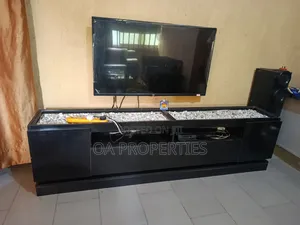 Tv Console With Led Light for Sale at Bodija Ibadan.43inchessmart Tv
