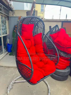Modern Black Wicker Hanging Swing Chair With Red Cushions
