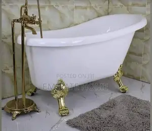 Bathtub With Complete Gold Standing Tap