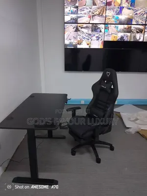 Ergonomic Office Gaming Chair and Electric Adjustable Height Desk.