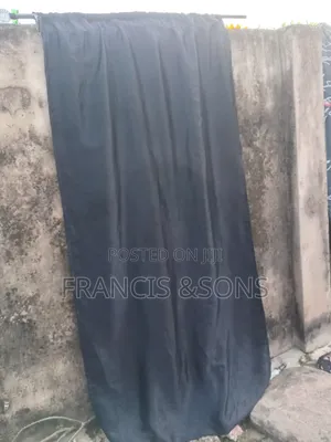 7 Curtains With Stained Hangers