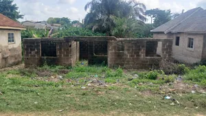 Uncompleted Building on a Plat of Land in a Close .