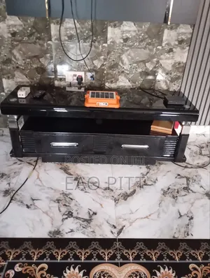 Tv Stand. Black Glass Top