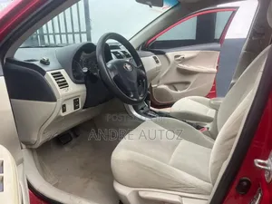 Toyota Corolla L 4dr Sedan (1.8L 4cyl 5M) 2013 Red