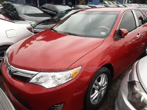 Toyota Camry LE 4dr Sedan w/Prod. End 11/13 (2.5L 4cyl 6A) 2014 Red
