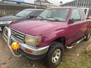 Toyota Tacoma Limited V6 4x4 Xtracab 121.9 in. WB 2000 Red