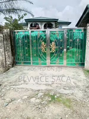Green Stainless Gate With Gold Horse
