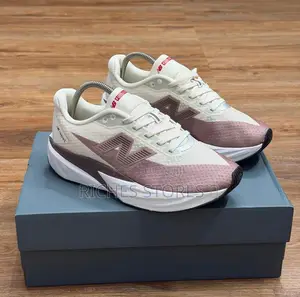New Balance Fuelcell Rebel V5 in the "Angora Earth Shadow" Colorway.