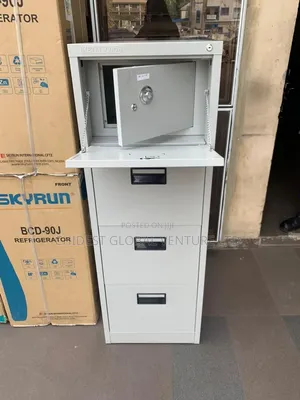 Four Drawer Cabinet With Safe Inside