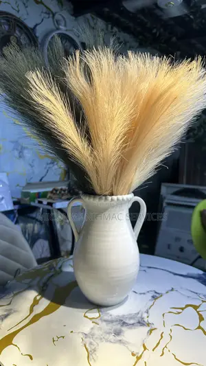 White Ceramic Vase With Pampas Grass