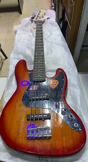 5-String Fender Jazz Bass Guitar With a Natural Maple Headstock