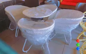 White Outdoor Rattan Chairs and Table