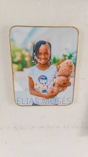 Mr Godsfavour Fotoframe