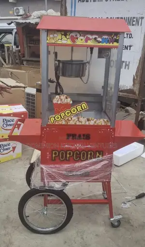 Electric Popcorn Machine With a Cart.