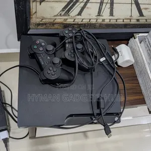 Grade a Uk Used Ps3 Slim With 2 Pads and 10 Games Installed