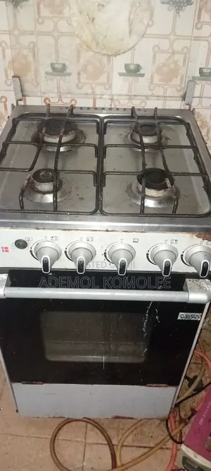 Scanfrost Gas With 4 Burner Cooking Used. With Oven Still Clean .