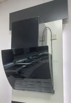 Sleek Black Glass Kitchen Extractor Hood – Modern Powerful.