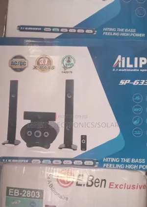 Home Theatre With a Loud Bass and 2 Longside Speakers and One Short .