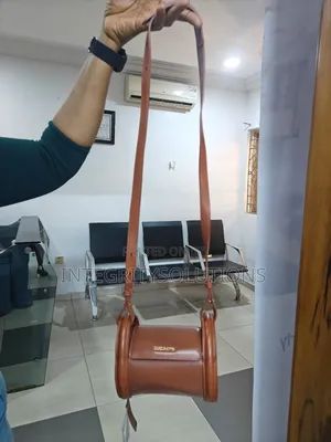 Brown Leather Cylinder Crossbody Bag
