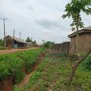 4 Plots of Land Fenced With Security House