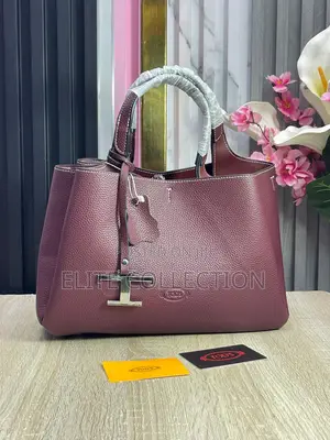 Tod Brand Bag Material:- Leather Gender:-Female Bag Size:- Midi